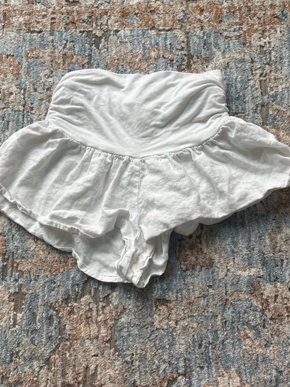 subdued white frilly shorts